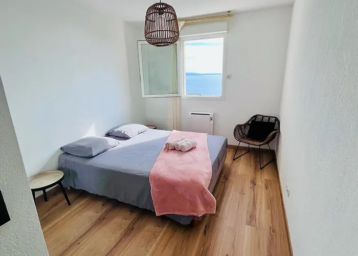 Apartament Capo Feno *
